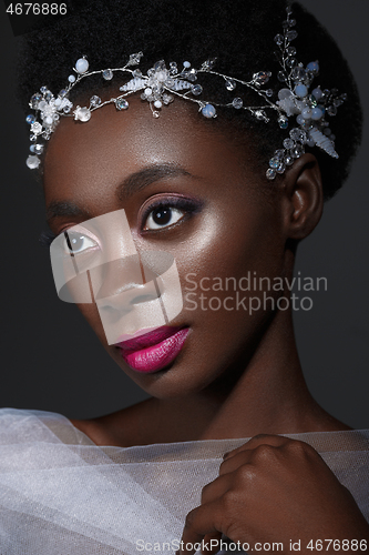 Image of Beautiful black girl with crystal wreath