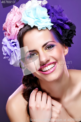 Image of beautiful girl with purple makeup