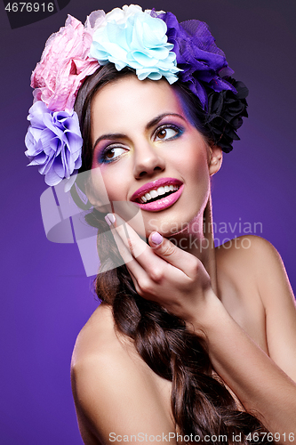 Image of beautiful girl with purple makeup