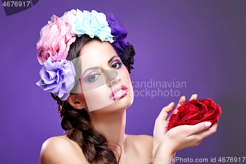 Image of beautiful girl with purple makeup