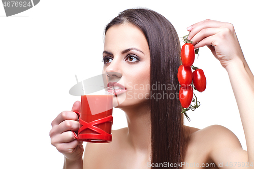 Image of girl with cherry tomatoes and juice 