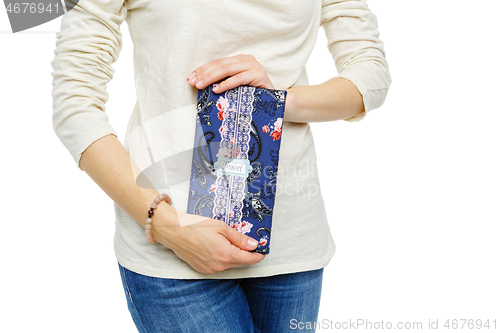 Image of beautiful scrapbooking folder in woman hand