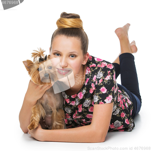 Image of Girl with yorkie dog