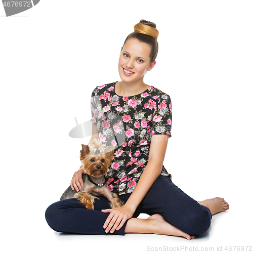 Image of Girl with yorkie dog