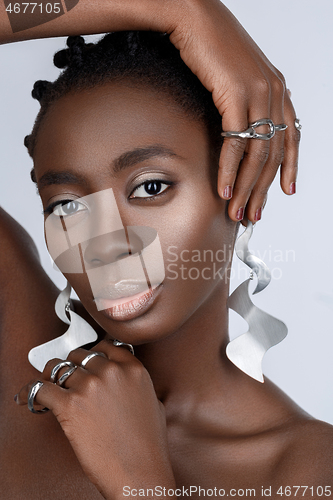 Image of Beautiful black girl with big earrings