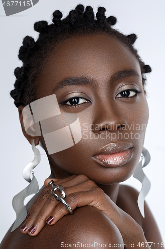 Image of Beautiful black girl with big earrings