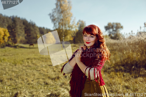 Image of Beautiful girl outdoors in countryside