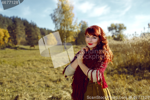 Image of Beautiful girl outdoors in countryside