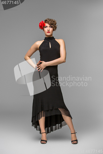 Image of girl dancer in tango dress