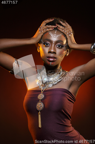 Image of Beautiful afro girl with drawings on skin