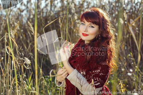 Image of Beautiful girl outdoors in countryside