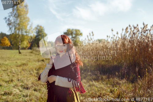 Image of Beautiful girl outdoors in countryside