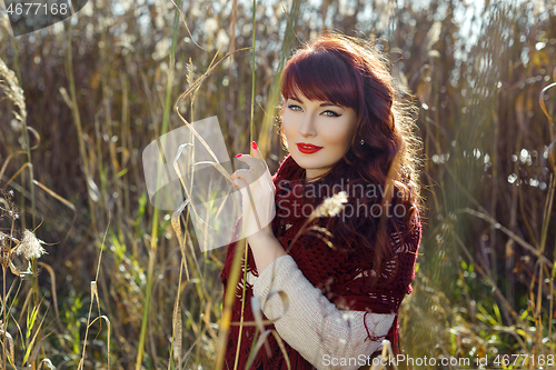 Image of Beautiful girl outdoors in countryside