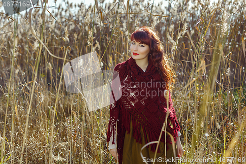 Image of Beautiful girl outdoors in countryside