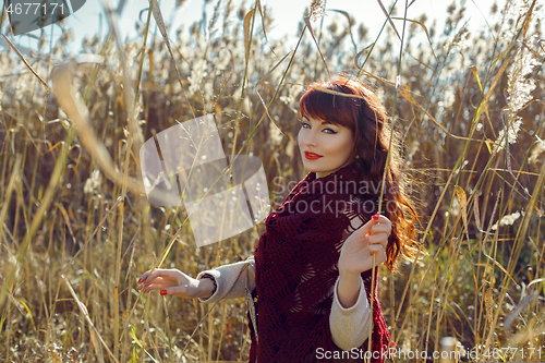 Image of Beautiful girl outdoors in countryside