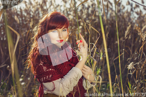 Image of Beautiful girl outdoors in countryside