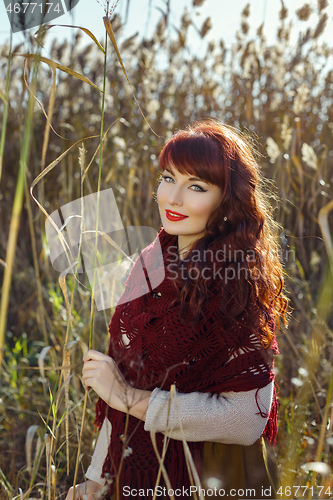 Image of Beautiful girl outdoors in countryside