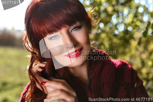 Image of Beautiful girl outdoors in countryside