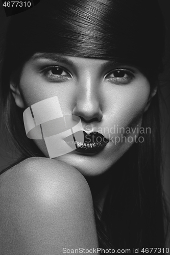 Image of beautiful girl with black lips