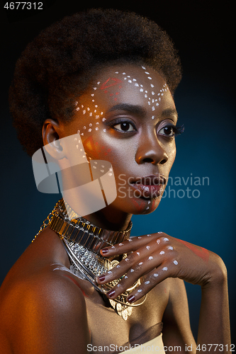 Image of Beautiful afro girl with drawings on skin