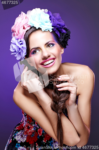 Image of beautiful girl with purple makeup