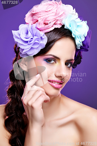 Image of beautiful girl with purple makeup