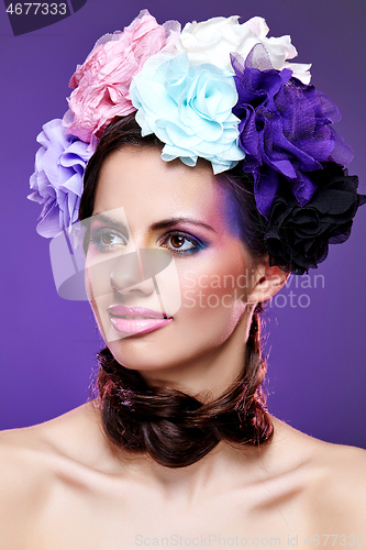 Image of beautiful girl with purple makeup