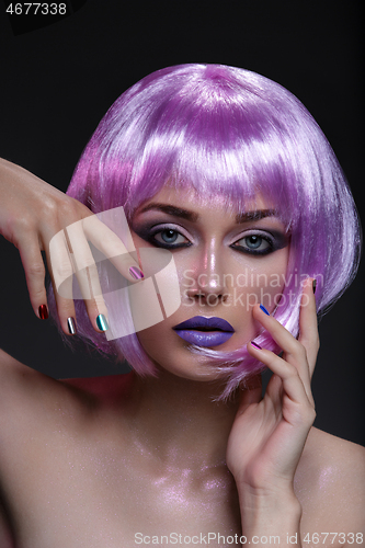 Image of Beautiful girl in purple wig