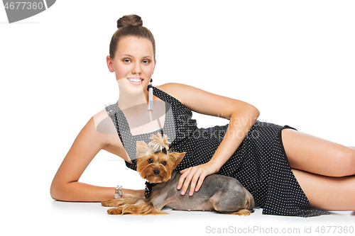 Image of Girl with yorkie dog