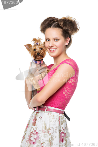 Image of Girl with yorkie dog