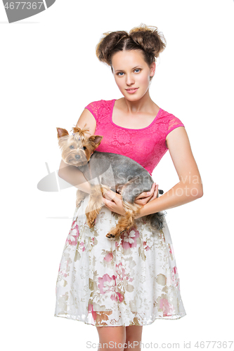 Image of Girl with yorkie dog