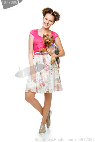 Image of Girl with yorkie dog