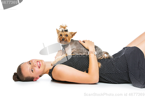 Image of Girl with yorkie dog