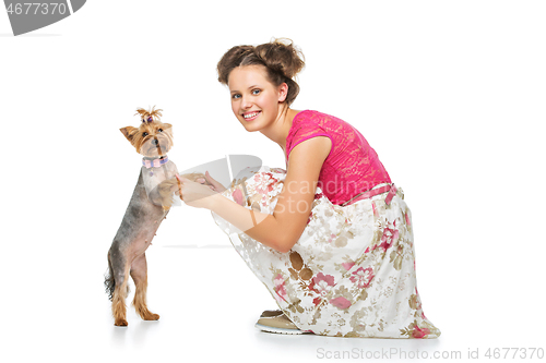 Image of Girl with yorkie dog