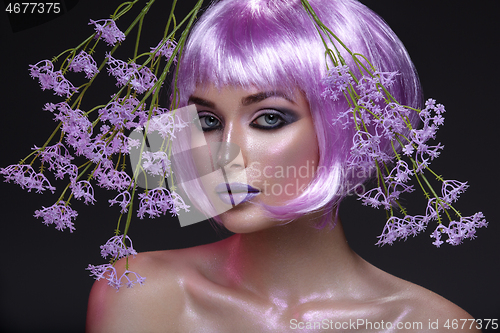 Image of Beautiful girl in purple wig