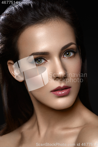 Image of Beautiful girl with cat eye liner makeup