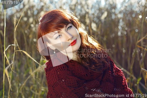 Image of Beautiful girl outdoors in countryside