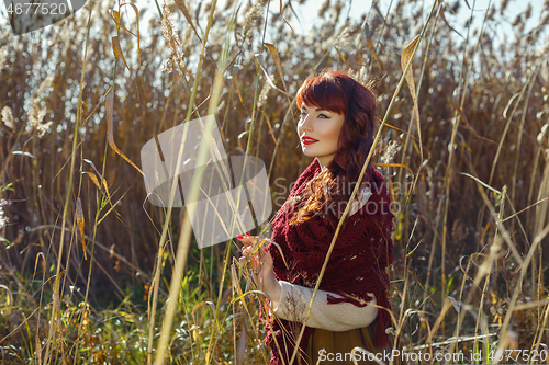 Image of Beautiful girl outdoors in countryside