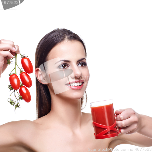 Image of girl with cherry tomatoes and juice 