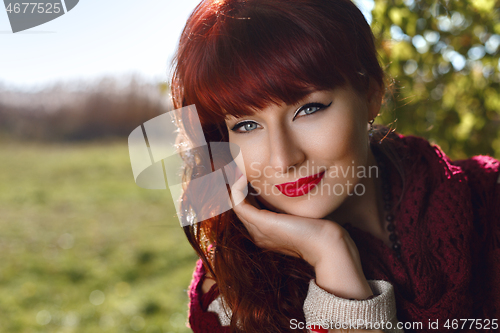 Image of Beautiful girl outdoors in countryside