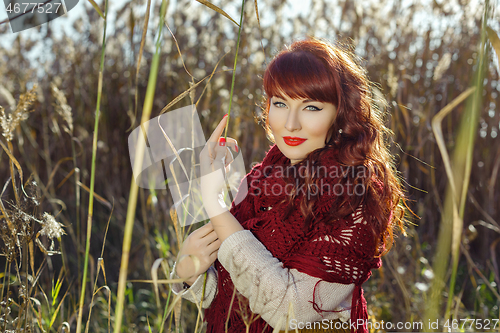 Image of Beautiful girl outdoors in countryside