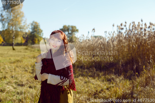 Image of Beautiful girl outdoors in countryside