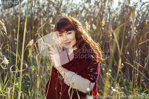 Image of Beautiful girl outdoors in countryside