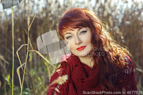 Image of Beautiful girl outdoors in countryside