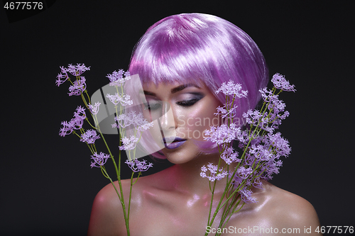 Image of Beautiful girl in purple wig