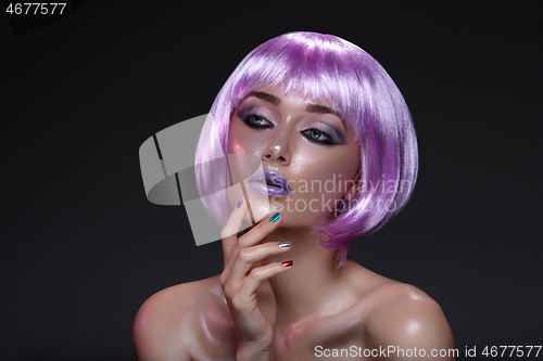 Image of Beautiful girl in purple wig