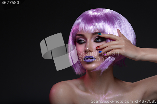 Image of Beautiful girl in purple wig