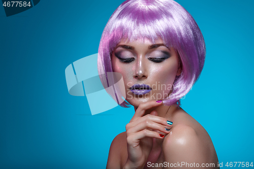 Image of Beautiful girl in purple wig