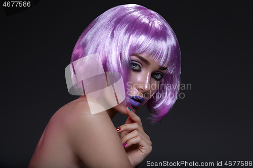 Image of Beautiful girl in purple wig