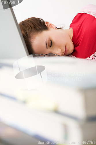 Image of Sleeping caucasian female student